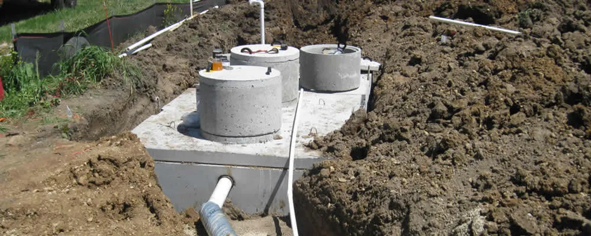 Septic system repair and installation site with tank access ports in Salt Lake City, UT